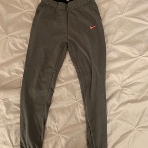 small grey and pink nike sweatpants